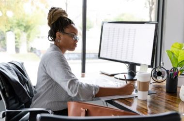 Photo of a woman using a computer